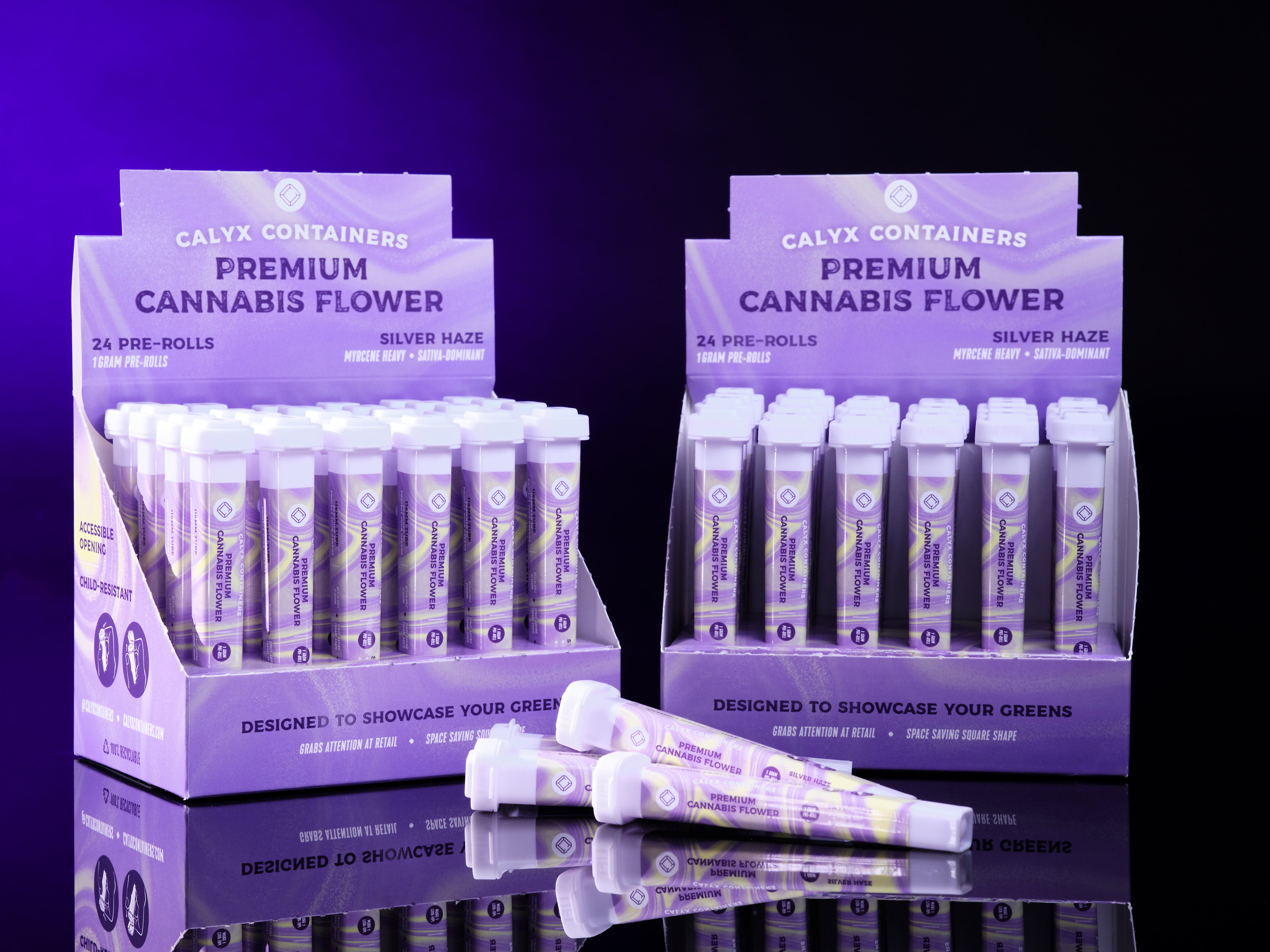 Display of Calyx Containers' premium joint tubes for cannabis flower packaging with purple and white design.