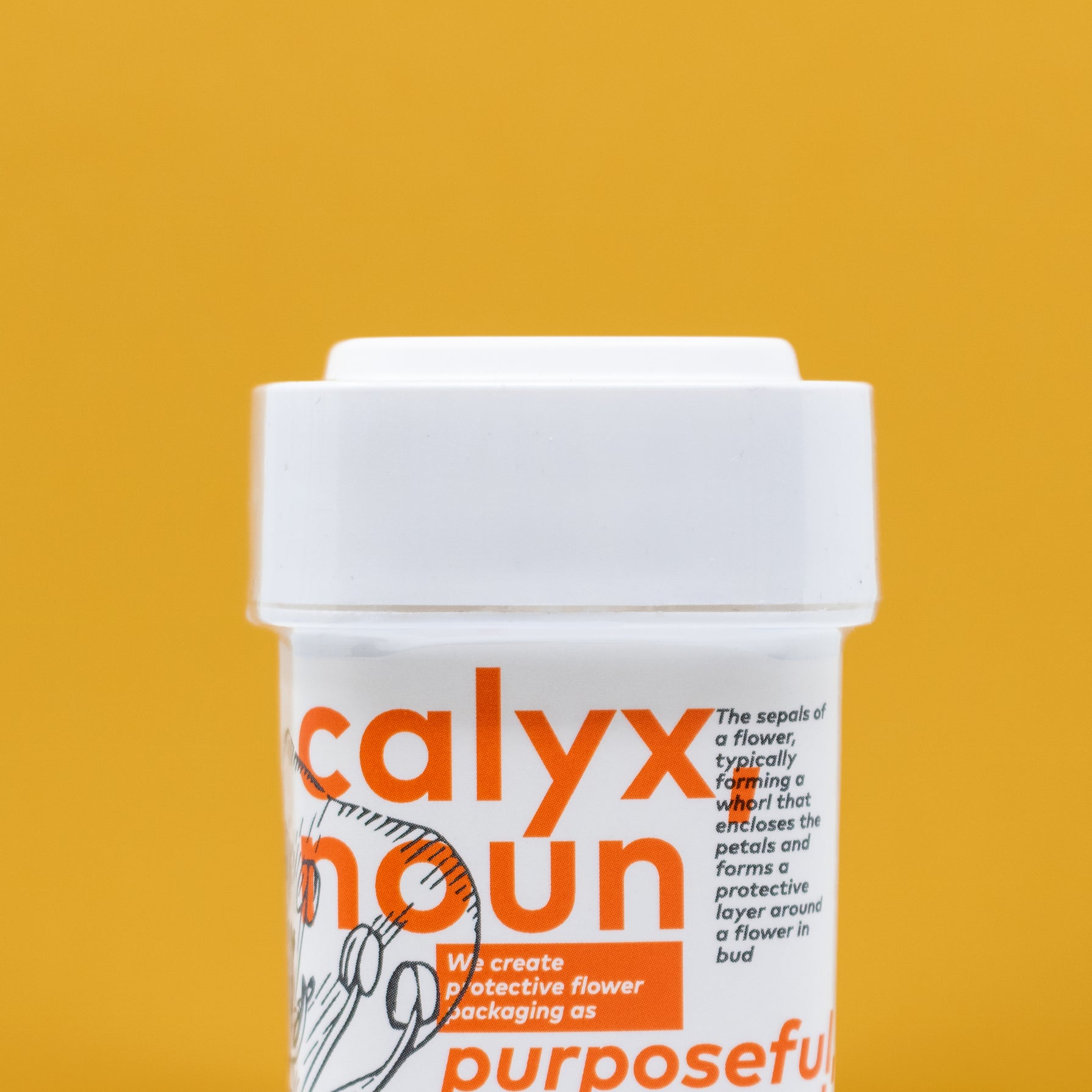 White labeled Calyx cannabis packaging on a yellow background.