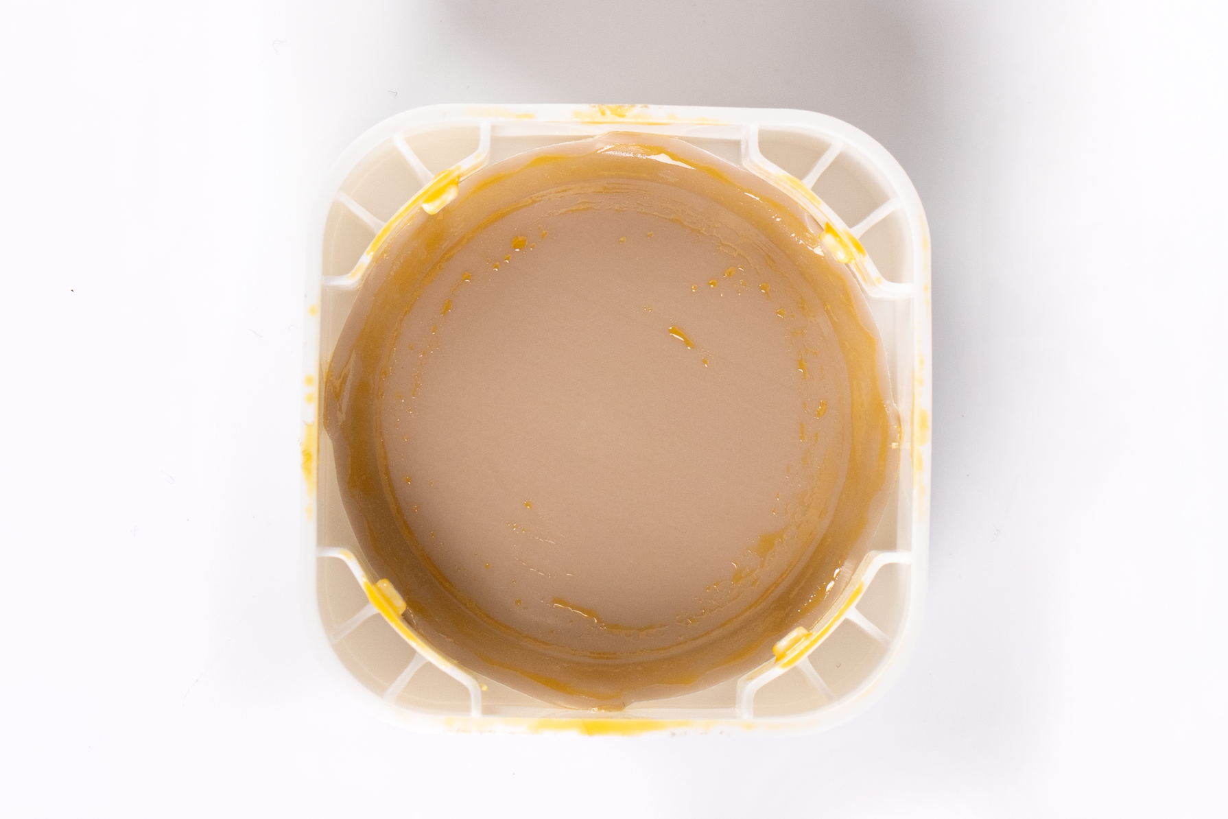 Dirty cannabis concentrate container lid