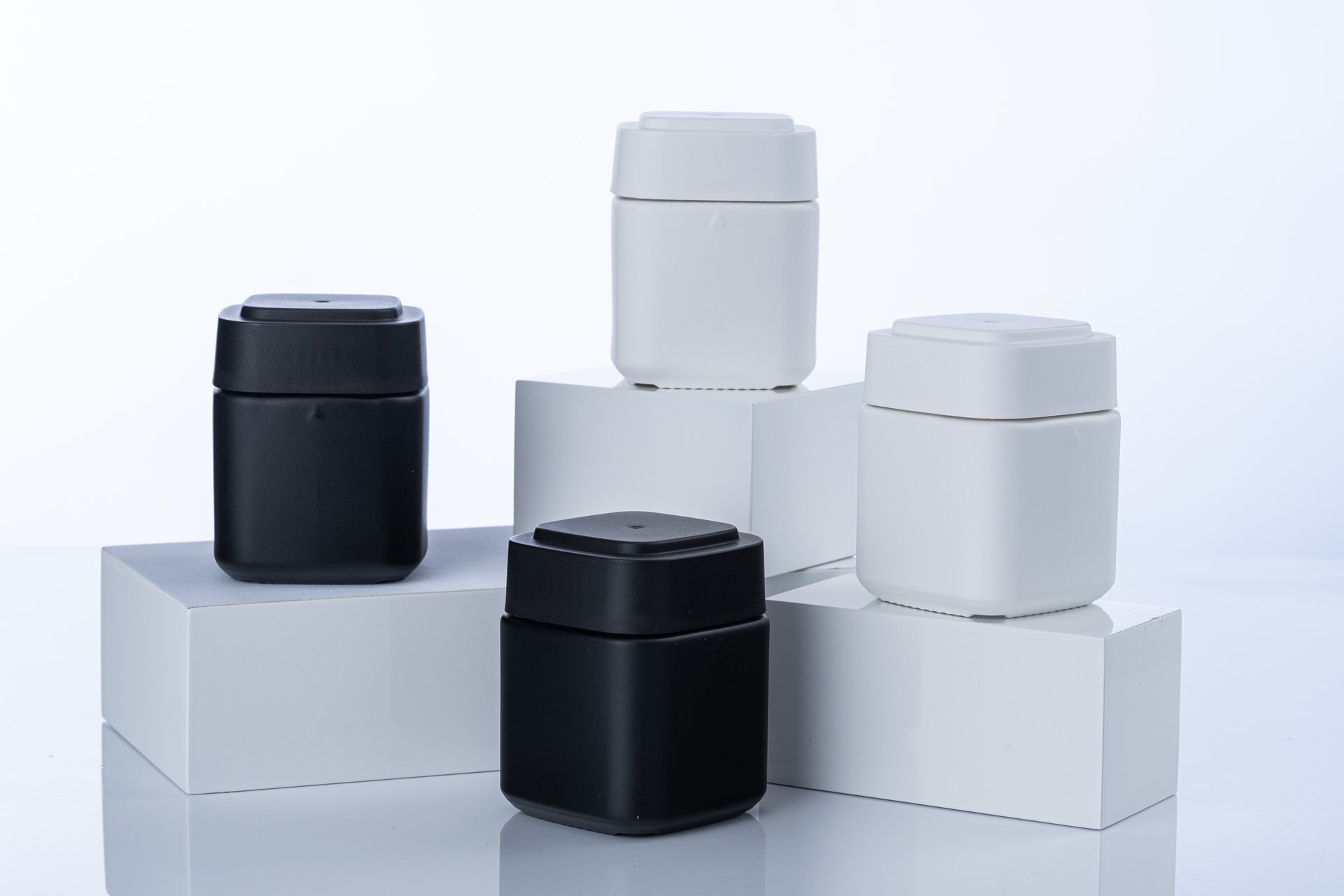 Calyx’s black and white cannabis containers