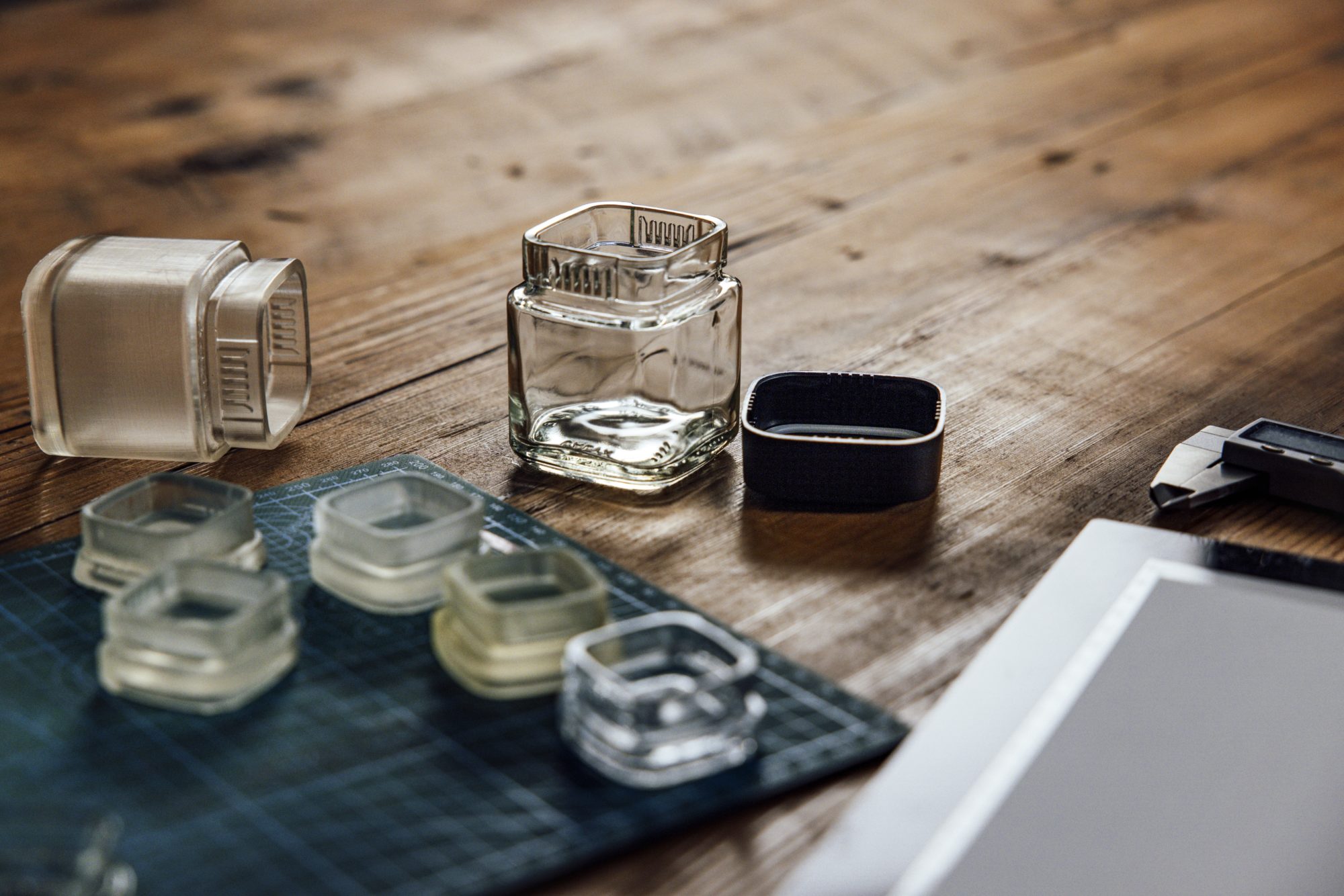 Calyx Jar's and Concentrate Containers on table